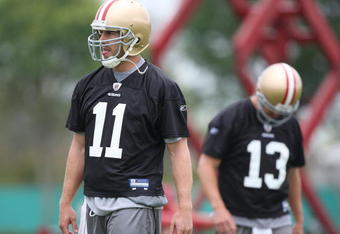 SANTA CLARA, CA - MAY 01:  Quarterbacks Alex Smith #11 and Shaun Hill #13 of the San Francisco 49ers look on during the 49ers Minicamp at their training facilities on May 1, 2009 in Santa Clara, California.  (Photo by Jed Jacobsohn/Getty Images)