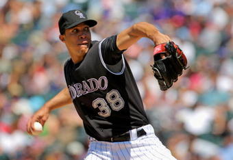 DENVER - MAY 27:  Starting pitcher Ubaldo Jimenez #38 of the Colorado Rockies delivers against the Los Angeles Dodgers at Coors Field on May 27, 2009 in Denver, Colorado. Jimenez collected the loss as the Dodgers defeated the Rockies 8-6.  (Photo by Doug Pensinger/Getty Images)