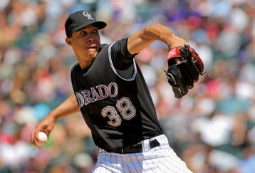 DENVER - MAY 27:  Starting pitcher Ubaldo Jimenez #38 of the Colorado Rockies delivers against the Los Angeles Dodgers at Coors Field on May 27, 2009 in Denver, Colorado. Jimenez collected the loss as the Dodgers defeated the Rockies 8-6.  (Photo by Doug Pensinger/Getty Images)