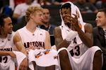 LOS ANGELES, CA - MARCH 12:  (L-R) Daniel Dillon, Chase Budinger #34, Jordan Hill #43 of the Arizona Wildcats share a laugh from the bench late in the second half of the 2008 Pacific Life Pac-10 Men's Basketball Tournament Day One against the Oregon State Beavers at Staples Center on March 12, 2008 in Los Angeles, California.  (Photo by Stephen Dunn/Getty Images)