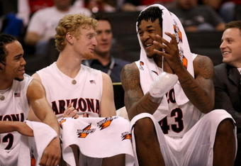 LOS ANGELES, CA - MARCH 12:  (L-R) Daniel Dillon, Chase Budinger #34, Jordan Hill #43 of the Arizona Wildcats share a laugh from the bench late in the second half of the 2008 Pacific Life Pac-10 Men's Basketball Tournament Day One against the Oregon State Beavers at Staples Center on March 12, 2008 in Los Angeles, California.  (Photo by Stephen Dunn/Getty Images)