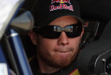 BROOKLYN, MI - JUNE 12:  Brian Vickers, driver of the #83 Red Bull Toyota, sits in his car during qualifying for the NASCAR Sprint Cup Series LifeLock 400 at Michigan International Speedway on June 12, 2009 in Brooklyn, Michigan.  (Photo by Jonathan Daniel/Getty Images)