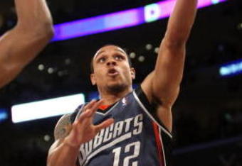 LOS ANGELES, CA - JANUARY 27:  Shannon Brown #12 of the Charlotte Bobcats goes up for a shot against the Los Angeles Lakers on January 27, 2009 at Staples Center in Los Angeles, California.  The Bobcats won 117-110 in double overtime.  NOTE TO USER: User expressly acknowledges and agrees that, by downloading and/or using this Photograph, user is consenting to the terms and conditions of the Getty Images License Agreement.  (Photo by Stephen Dunn/Getty Images)