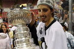 DETROIT - JUNE 12:  Marc-Andre Fleury #29 of the Pittsburgh Penguins celebrates with the Stanley Cup after defeating the Detroit Red Wings by a score of 2-1 to win Game Seven and the 2009 NHL Stanley Cup Finals at Joe Louis Arena on June 12, 2009 in Detroit, Michigan.  (Photo by Jim McIsaac/Getty Images)