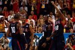 BEIJING - AUGUST 24: Kobe Bryant #10 of the United States celebrate a play with teammates Chris Paul #13, Dwyane Wade #9 and Chris Bosh #12 in the gold medal game against Spain during Day 16 of the Beijing 2008 Olympic Games at the Beijing Olympic Basketball Gymnasium on August 24, 2008 in Beijing, China.  (Photo by Streeter Lecka/Getty Images)