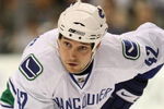 DALLAS - MARCH 24:  Center Kyle Wellwood #42 of the Vancouver Canucks during play against the Dallas Stars at the American Airlines Center on March 24 , 2009 in Dallas, Texas.  (Photo by Ronald Martinez/Getty Images)