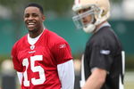 SANTA CLARA, CA - MAY 01:  Michael Crabtree #15 of the San Francisco 49ers looks on during practice as quaterback Alex Smith #11 practices during the 49ers Minicamp at their training facilities on May 1, 2009 in Santa Clara, California. Crabtree was the 49ers first round draft pick.  (Photo by Jed Jacobsohn/Getty Images)