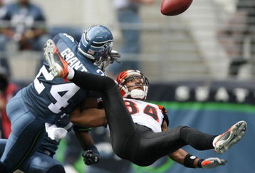 SEATTLE - SEPTEMBER 23:  Strong safety Deon Grant #24 of the Seattle Seahawks breaks up this pass in the end zone against wide receiver T.J. Houshmandzadeh #84 of the Cincinnati Bengals in the second half at Qwest Field on September 23, 2007 in Seattle, Washington.  The Seahawks defeated the Bengals 24-21.  (Photo by Otto Greule Jr/Getty Images)