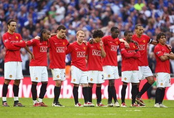 LONDON, ENGLAND - APRIL 19:  Manchester United players look on in the penalty shoot out during the FA Cup sponsored by E.ON Semi Final match between Everton and Manchester United at Wembley Stadium on April 19, 2009 in London, England.  (Photo by Phil Cole/Getty Images)