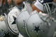 OXNARD, CA - JULY 29:  Fans of the Dallas Cowboys wait for players to sign their Cowboy helmets during the first day of training camp for the Cowboys on July 29, 2006 at the River Ridge Field in Oxnard, California.  (Photo by Stephen Dunn/Getty Images)