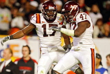 MIAMI - JANUARY 01: Kam Chancellor #17 of the Virginia Tech Hokies celebrates after making an interception with teammate Nekos Brown #47 against  the Cincinnati Bearcats the FedEx Orange Bowl at Dolphin Stadium on January 1, 2009 in Miami, Florida.  (Photo by Streeter Lecka/Getty Images)