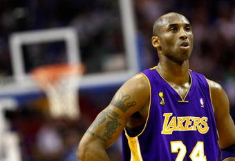 ORLANDO, FL - JUNE 11:  Kobe Bryant #24 of the Los Angeles Lakers looks across the court in the first half against the Orlando Magic in Game Four of the 2009 NBA Finals on June 11, 2009 at Amway Arena in Orlando, Florida.  NOTE TO USER:  User expressly acknowledges and agrees that, by downloading and or using this photograph, User is consenting to the terms and conditions of the Getty Images License Agreement.  (Photo by Chris Graythen/Getty Images)