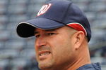 ATLANTA - APRIL 11:  Manager Manny Acta #14 of  the Washington Nationals watches batting practice before play against the Atlanta Braves on April 11, 2009 at Turner Field in Atlanta, Georgia.  (Photo by Al Messerschmidt/Getty Images) 