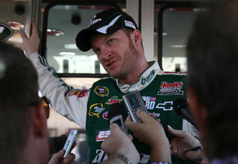 BROOKLYN, MI - JUNE 12: Dale Earnhardt Jr., driver of the #88 AMP Energy/National Guard Chevrolet speaks to the media during practice for the NASCAR Sprint Cup Series LifeLock 400 at Michigan International Speedway on June 12, 2009 in Brooklyn, Michigan.  (Photo by Jonathan Daniel/Getty Images)