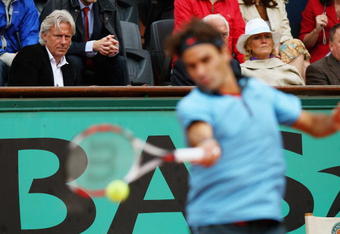 PARIS - JUNE 07:  Former Tennis player Bjorn Borg watches Roger Federer of Switzerland in action during the Men's Singles Final match against Robin Soderling of Sweden on day fifteen of the French Open at Roland Garros on June 7, 2009 in Paris, France.  (Photo by Ryan Pierse/Getty Images)