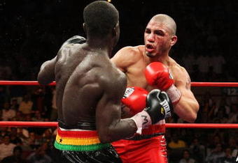 NEW YORK - JUNE 13:  Miguel Cotto punches Joshua Clottey during their WBO Welterweight title fight at Madison Square Garden on June 13, 2009 in New York City.  (Photo by Al Bello/Getty Images)