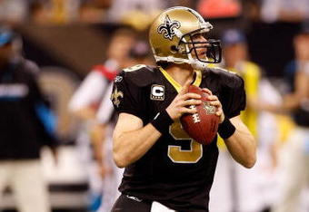 NEW ORLEANS - DECEMBER 28:  Quarterback Drew Brees #9 of the New Orleans Saints drops back to pass during the game against the Carolina Panthers on December 28, 2008 at the Superdome in New Orleans, Louisiana.  (Photo by Chris Graythen/Getty Images)