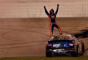 NASHVILLE, TN - JUNE 06:  Kyle Busch, driver of the #18 NOS Energy Drink Toyota celebrates after winning the NASCAR Nationwide Series Federated Auto Parts 300 at the Nashville Superspeedway on June 6, 2009 in Lebanon,Tennessee.  (Photo by Chris Graythen/Getty Images for NASCAR)