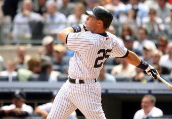 NEW YORK - APRIL 17:  Mark Teixeira #25 of the New York Yankees hits a home run in the third inning against the Cleveland Indians at Yankee Stadium on April 17, 2009 in the Bronx borough of New York City.  (Photo by Ezra Shaw/Getty Images)