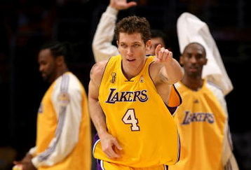LOS ANGELES, CA - JUNE 12:  Luke Walton #4 of the Los Angeles Lakers celebrates a basket in the first half against the Boston Celtics Game Four of the 2008 NBA Finals on June 12, 2008 at Staples Center in Los Angeles, California.  NOTE TO USER: User expressly acknowledges and agrees that, by downloading and/or using this Photograph, user is consenting to the terms and conditions of the Getty Images License Agreement.  (Photo by Stephen Dunn/Getty Images)