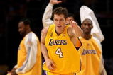 LOS ANGELES, CA - JUNE 12:  Luke Walton #4 of the Los Angeles Lakers celebrates a basket in the first half against the Boston Celtics Game Four of the 2008 NBA Finals on June 12, 2008 at Staples Center in Los Angeles, California.  NOTE TO USER: User expressly acknowledges and agrees that, by downloading and/or using this Photograph, user is consenting to the terms and conditions of the Getty Images License Agreement.  (Photo by Stephen Dunn/Getty Images)