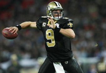 LONDON - OCTOBER 26: Drew Brees of the New Orleans Saints throws the ball during the Bridgestone International Series NFL match between San Diego Chargers and New Orleans Saints at Wembley Stadium on October 26, 2008 in London, England.  (Photo by Nick Laham/Getty Images)