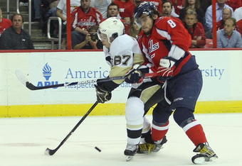 WASHINGTON - MAY 13:  Alex Ovechkin #8 of the Washington Capitals skates against Sidney Crosby #87 of the Pittsburgh Penguins during Game Seven of the Eastern Conference Semifinal  Round of the 2009 Stanley Cup Playoffs at Verizon Center on May 13, 2009 in Washington, DC.  (Photo by Bruce Bennett/Getty Images)