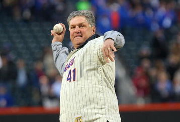 NEW YORK - APRIL 13:  Former Mets pitcher Tom Seaver throws out the ceremonial first pitch before the San Diego Padres against the New York Mets during opening day at Citi Field on April 13, 2009 in the Flushing neighborhood of the Queens borough of New York City. This is the first regular season MLB game being played at the new venue which replaced Shea stadium as the Mets home field.  (Photo by Jim McIsaac/Getty Images)