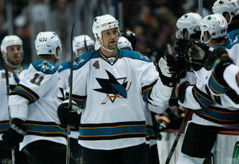 ANAHEIM, CA - APRIL 27:  Rob Blake #4 of the San Jose Sharks is congratulated by his teammates on an assist against the Anaheim Ducks during Game Six of the Western Conference Quarterfinal Round of the 2009 Stanley Cup Playoffs at the Honda Center on April 27, 2009 in Anaheim, California.  (Photo by Jeff Gross/Getty Images)