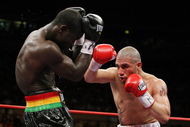 NEW YORK - JUNE 13:  Miguel Cotto punches Joshua Clottey during their WBO Welterweight title fight at Madison Square Garden on June 13, 2009 in New York City.  (Photo by Al Bello/Getty Images)