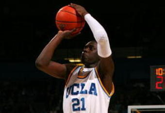 WESTWOOD, CA - MARCH 05:  Jrue Holiday #21 of the UCLA Bruins shoots the outside jump shot in the second half during their NCAA basketball game against the UCLA Bruins at Pauley Pavilion on March 5, 2009 in Westwood, California. The Bruins defeated the Beavers 79-54. (Photo by Victor Decolongon/Getty Images)