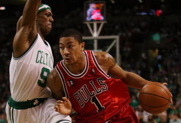 BOSTON - MAY 02:  Derrick Rose #1 of the Chicago Bulls drives to the net as Rajon Rondo #9 of the Boston Celtics defends in Game Seven of the Eastern Conference Quarterfinals during the 2009 NBA Playoffs at TD Banknorth Garden on May 2, 2009 in Boston, Massachusetts. The Celtics defeated the Bulls 109-99. NOTE TO USER: User expressly acknowledges and agrees that, by downloading and or using this photograph, User is consenting to the terms and conditions of the Getty Images License Agreement.  (Photo by Elsa/Getty Images)