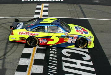 BROOKLYN, MI - JUNE 14:  Mark Martin, driver of the #5 CARQUEST/Kellogg's Chevrolet, crosses the finish line to win the NASCAR Sprint Cup Series LifeLock 400 at Michigan International Speedway on June 14, 2009 in Brooklyn, Michigan.  (Photo by Chris Trotman/Getty Images)