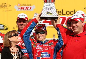 BROOKLYN, MI - JUNE 14:  Mark Martin, driver of the #5 CARQUEST/Kellogg's Chevrolet, celebrates in victory lane after winning the NASCAR Sprint Cup Series LifeLock 400 at Michigan International Speedway on June 14, 2009 in Brooklyn, Michigan.  (Photo by Ezra Shaw/Getty Images)