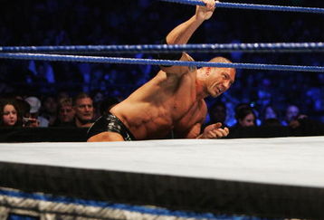 SYDNEY, AUSTRALIA - JUNE 15:  Batista climbs back into the ring against World Heavyweight Champion Edge during WWE Smackdown at Acer Arena on June 15, 2008 in Sydney, Australia.  (Photo by Gaye Gerard/Getty Images)
