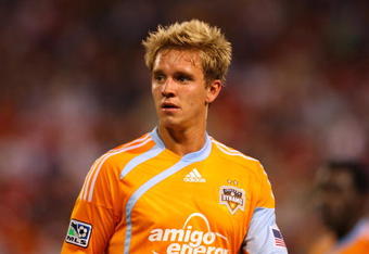 EAST RUTHERFORD, NJ - MAY 16:  Stuart Holden #22 of the Houston Dynamo looks on against the New York Red Bulls at Giants Stadium in the Meadowlands on May 16, 2009 in East Rutherford, New Jersey. Houston and New York play to a 1-1 Tie.  (Photo by Mike Stobe/Getty Images for New York Red Bull)