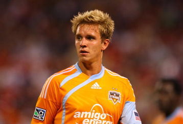 EAST RUTHERFORD, NJ - MAY 16:  Stuart Holden #22 of the Houston Dynamo looks on against the New York Red Bulls at Giants Stadium in the Meadowlands on May 16, 2009 in East Rutherford, New Jersey. Houston and New York play to a 1-1 Tie.  (Photo by Mike Stobe/Getty Images for New York Red Bull)
