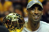 ORLANDO, FL - JUNE 14:  Kobe Bryant #24 of the Los Angeles Lakers celebrates with the Larry O'Brien Trophy after defeating the Orlando Magic 99-86 in Game Five of the 2009 NBA Finals on June 14, 2009 at Amway Arena in Orlando, Florida.  NOTE TO USER:  User expressly acknowledges and agrees that, by downloading and or using this photograph, User is consenting to the terms and conditions of the Getty Images License Agreement.  (Photo by Ronald Martinez/Getty Images)
