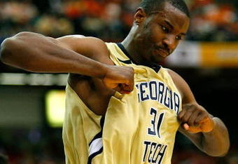 ATLANTA - MARCH 12:  Gani Lawal #31 of the Georgia Tech Yellow Jackets reacts after dunking against the Clemson Tigers during day one of the 2009 ACC Men's Basketball Tournament on March 12, 2009 at the Georgia Dome in Atlanta, Georgia.  (Photo by Kevin C. Cox/Getty Images)
