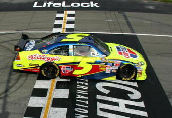 BROOKLYN, MI - JUNE 14:  Mark Martin, driver of the #5 CARQUEST/Kellogg's Chevrolet, crosses the finish line to win the NASCAR Sprint Cup Series LifeLock 400 at Michigan International Speedway on June 14, 2009 in Brooklyn, Michigan.  (Photo by Chris Trotman/Getty Images)