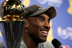 ORLANDO, FL - JUNE 14:  Kobe Bryant #24 of the Los Angeles Lakers smiles during the post game news conference after the Lakers defeated the Orlando Magic 99-86 to win the NBA Championship in Game Five of the 2009 NBA Finals on June 14, 2009 at Amway Arena in Orlando, Florida.  NOTE TO USER:  User expressly acknowledges and agrees that, by downloading and or using this photograph, User is consenting to the terms and conditions of the Getty Images License Agreement.  (Photo by Elsa/Getty Images)
