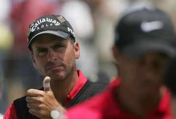 SAN DIEGO - JUNE 16:  Tiger Woods walks away from runner-up Rocco Mediate after winning on the first sudden death playoff hole during the playoff round of the 108th U.S. Open at the Torrey Pines Golf Course (South Course) on June 16, 2008 in San Diego, California.  (Photo by Jeff Gross/Getty Images)