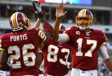 PHILADELPHIA - OCTOBER 05:  Jason Campbell #17 of the Washington Redskins congratulates teammate Clinton Portis #26 after his touchdown against the Philadelphia Eagles on October 5, 2008 at Lincoln Financial Field in Philadelphia, Pennsylvania.  (Photo by Chris McGrath/Getty Images)