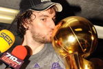 ORLANDO, FL - JUNE 14:  Pau Gasol #16 of the Los Angeles Lakers kisses the Larry O'Brien trophy in the locker room after the Lakers defeated the Orlando Magic 99-86 in Game Five of the 2009 NBA Finals on June 14, 2009 at Amway Arena in Orlando, Florida.  NOTE TO USER:  User expressly acknowledges and agrees that, by downloading and or using this photograph, User is consenting to the terms and conditions of the Getty Images License Agreement.  (Photo by Ronald Martinez/Getty Images)