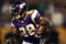 MINNEAPOLIS - JANUARY 4:   Adrian Peterson #28 of the Minnesota Vikings carries the ball in the first half against the Philadelphia Eagles during the NFC Wild Card playoff game on January 4,2009 at the Hubert H. Humphrey Metrodome in Minneapolis, Minnesota. (Photo by Elsa/Getty Images)