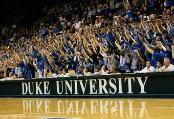 DURHAM, NC - FEBRUARY 11:  Duke Blue Devils fans hold up their hands during the game against the North Carolina Tar Heels on February 11, 2009 at Cameron Indoor Stadium in Durham, North Carolina.  (Photo by Kevin C. Cox/Getty Images)