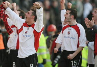 CUMBERNAULD, UNITED KINGDOM - JANUARY 08: Alex Williams (L) and Gary Arbuckle of Clyde celebrates after the Scottish Cup 3rd round match against Celtic at Broadwood stadium January 8, 2006 in Cumbernauld, Scotland. Clyde won the match 2-1.  (Photo by Jeff J Mitchell/Getty Images)