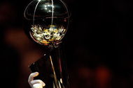 ORLANDO, FL - JUNE 14:  Pau Gasol #16 of the Los Angeles Lakers holds up the Larry O'Brien trophy after the Lakers defeated the Orlando Magic 99-86 in Game Five of the 2009 NBA Finals on June 14, 2009 at Amway Arena in Orlando, Florida.  NOTE TO USER:  User expressly acknowledges and agrees that, by downloading and or using this photograph, User is consenting to the terms and conditions of the Getty Images License Agreement.  (Photo by Ronald Martinez/Getty Images)