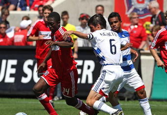 BRIDGEVIEW, IL - MAY 31: Patrick Nyarko #14 of the Chicago Fire controls the ball under pressure from Pablo Ricchetti #6 of FC Dallas on May 31, 2009 at Toyota Park in Bridgeview, Illinois. FC Dallas defeated the Fire 3-0. (Photo by Jonathan Daniel/Getty Images)