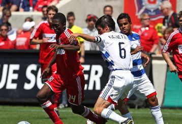 BRIDGEVIEW, IL - MAY 31: Patrick Nyarko #14 of the Chicago Fire controls the ball under pressure from Pablo Ricchetti #6 of FC Dallas on May 31, 2009 at Toyota Park in Bridgeview, Illinois. FC Dallas defeated the Fire 3-0. (Photo by Jonathan Daniel/Getty Images)